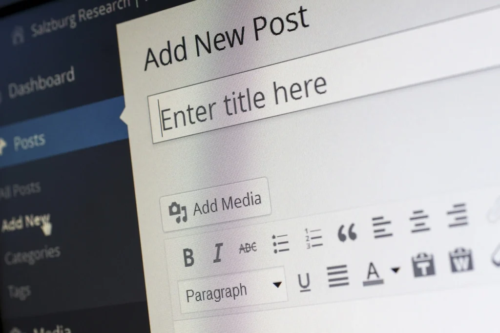 Blogger creating quality content with compelling headlines, structured writing, and engaging visuals.